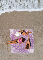 boho girls on oversized Turkish towel with tassels, mandala beach towel sand-free amethyst color, sustainable beach blanket