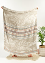 Flourishing Oversized Turkish Towel Bezzazan, used as light decorative throw blanket in modern boho minimalist living room