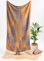 holistic lifestyle essential versatile minimalist Turkish towel throw blanket with tassels in cozy modern boho living room
